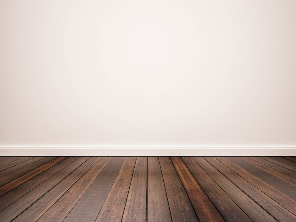 Hardwood Floors And White Wall