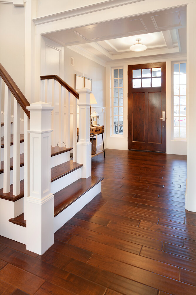 Elegant Hardwood Flooring in foyer of home.