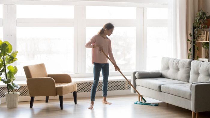 Flooring Maintenance Young Woman Cleaning Hardwood Floor
